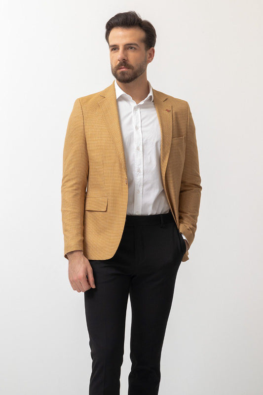 Close-up of a yellow textured blazer from HolloMen, showcasing modern elegance and bold style.