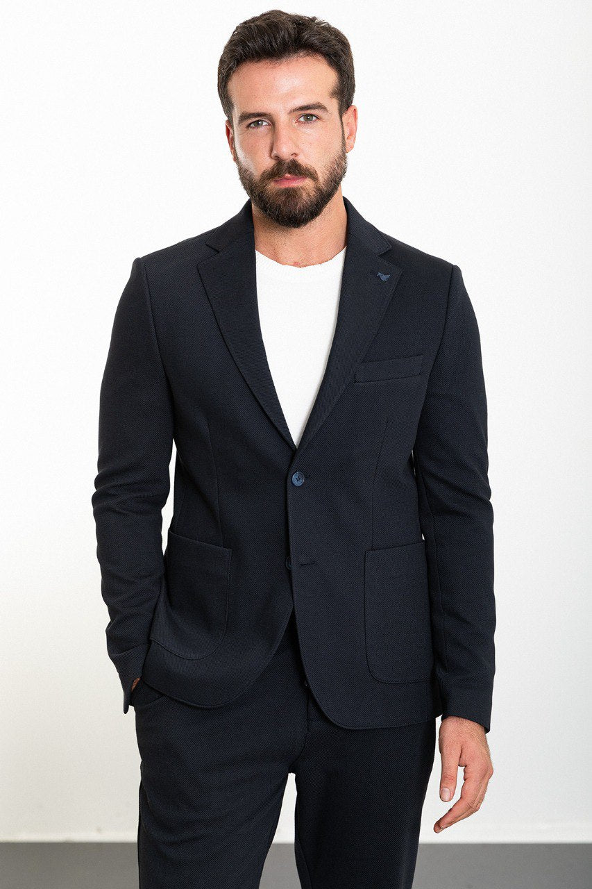 Man wearing a navy blue casual summer suit from HolloMen, ideal for a stylish yet relaxed look.