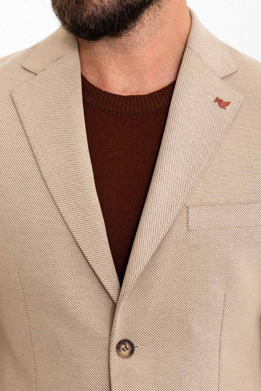 Man wearing a beige casual suit from HolloMen's Spring Summer Collection.