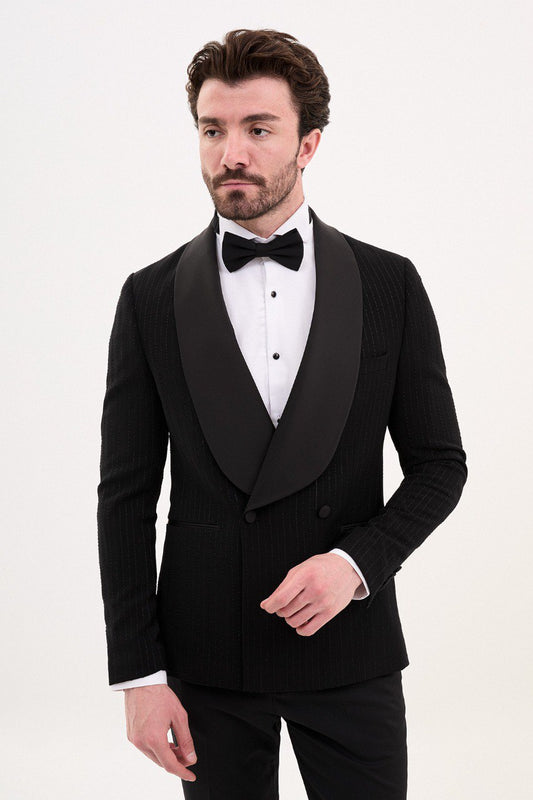 Model wearing a black shawl collar tuxedo from HolloMen, highlighting the refined and modern design perfect for formal events.