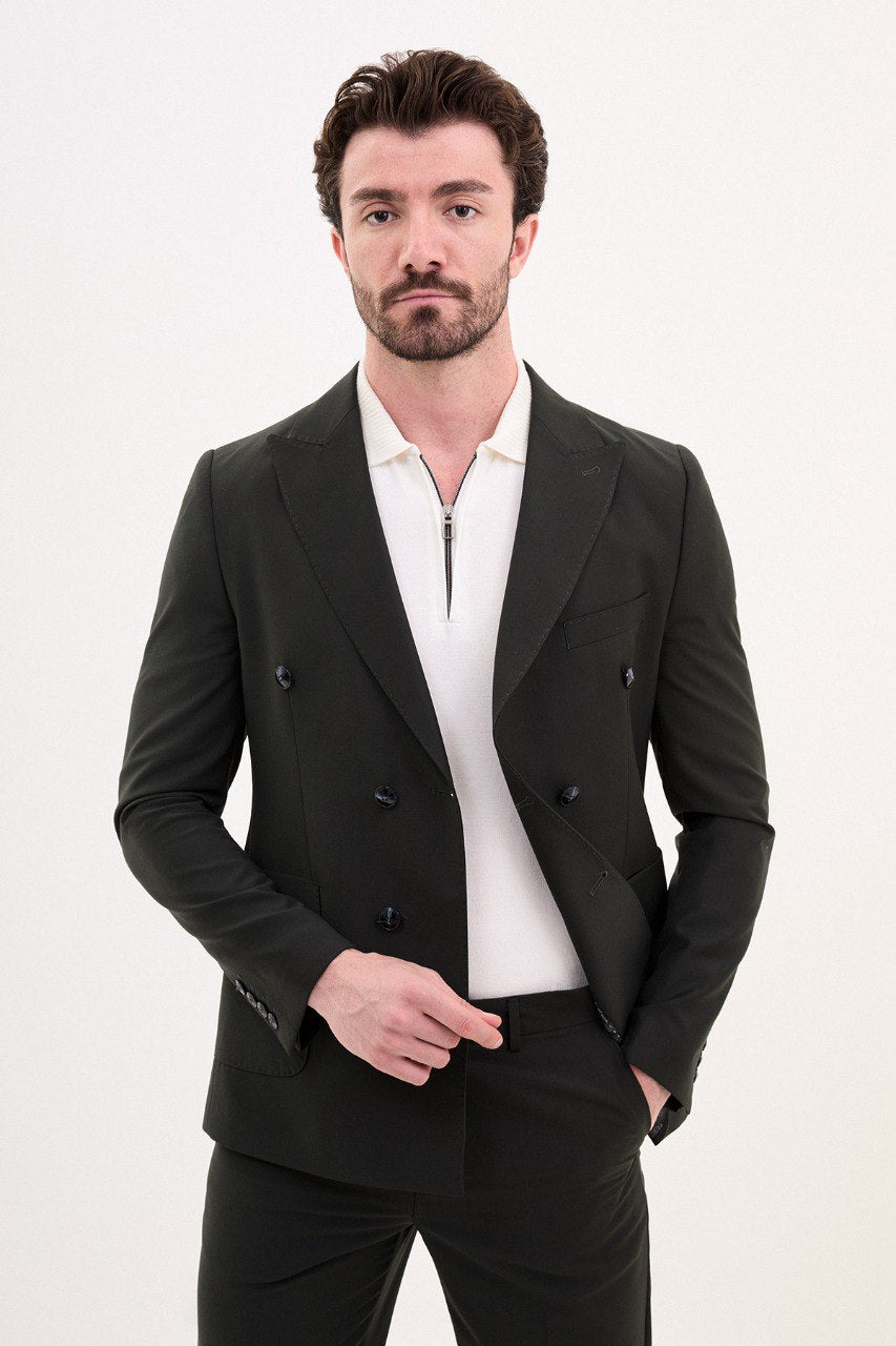 Man wearing a double-breasted black casual suit with white sneakers from HolloMen's Spring Summer Collection.