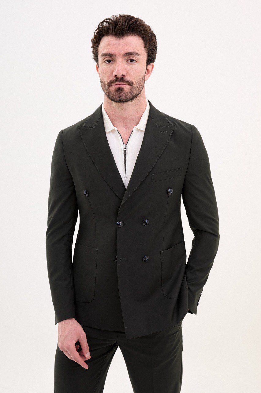 Man wearing a double-breasted black casual suit with white sneakers from HolloMen's Spring Summer Collection.