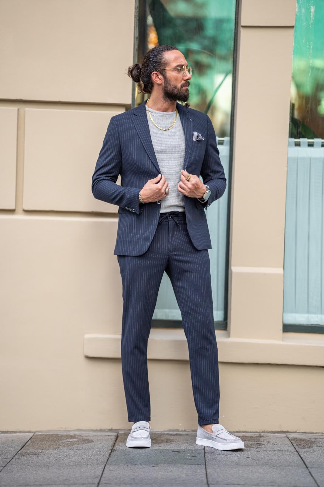 A Navy-Blue Plaid Suit on display.