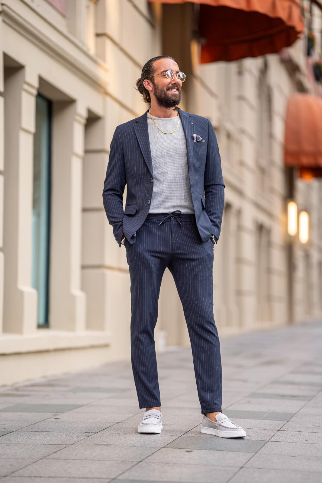 A Navy-Blue Plaid Suit on display.