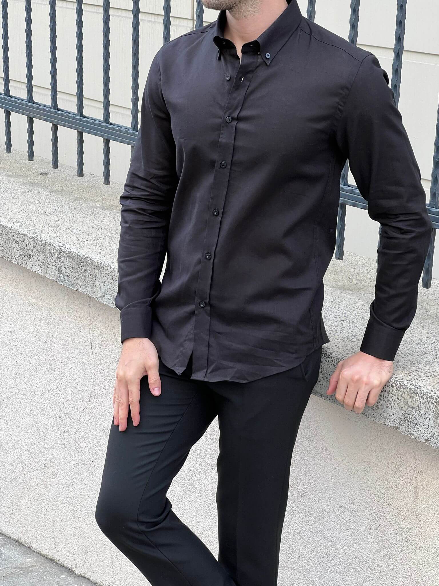 Captivating image of a male model in a black cotton shirt, highlighting comfort and elegance.