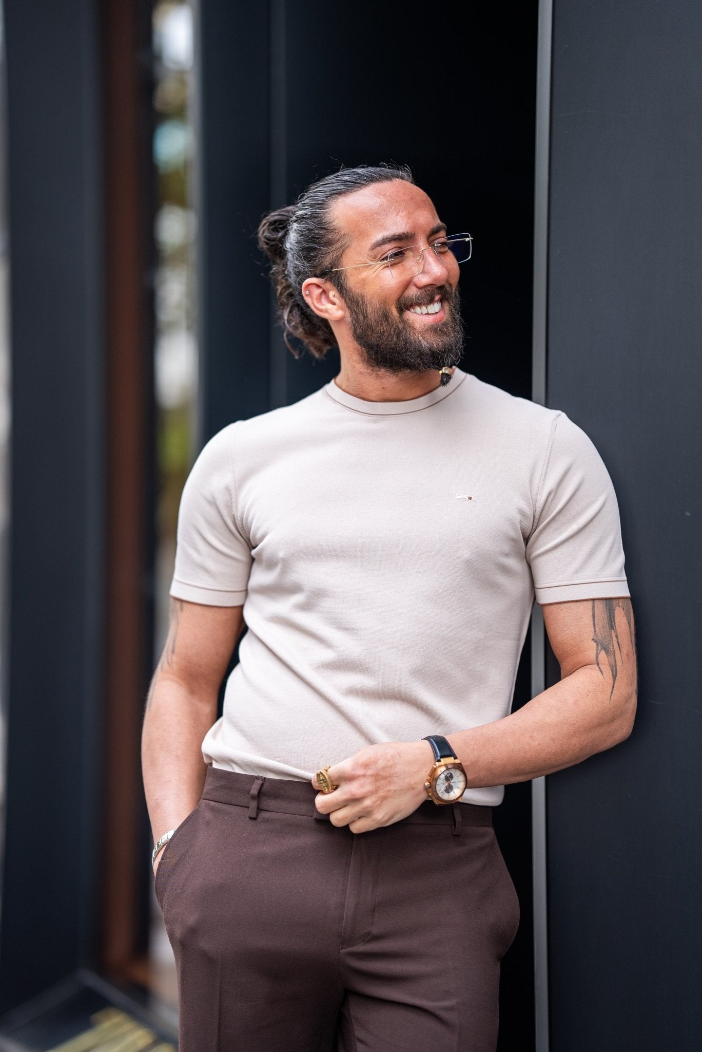 A Beige T-shirt worn by a model