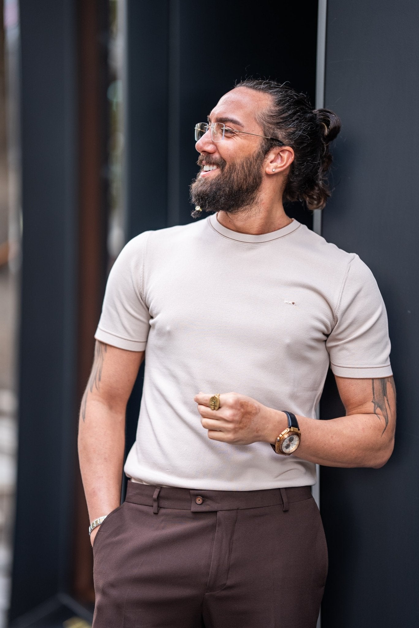 A Beige T-shirt worn by a model