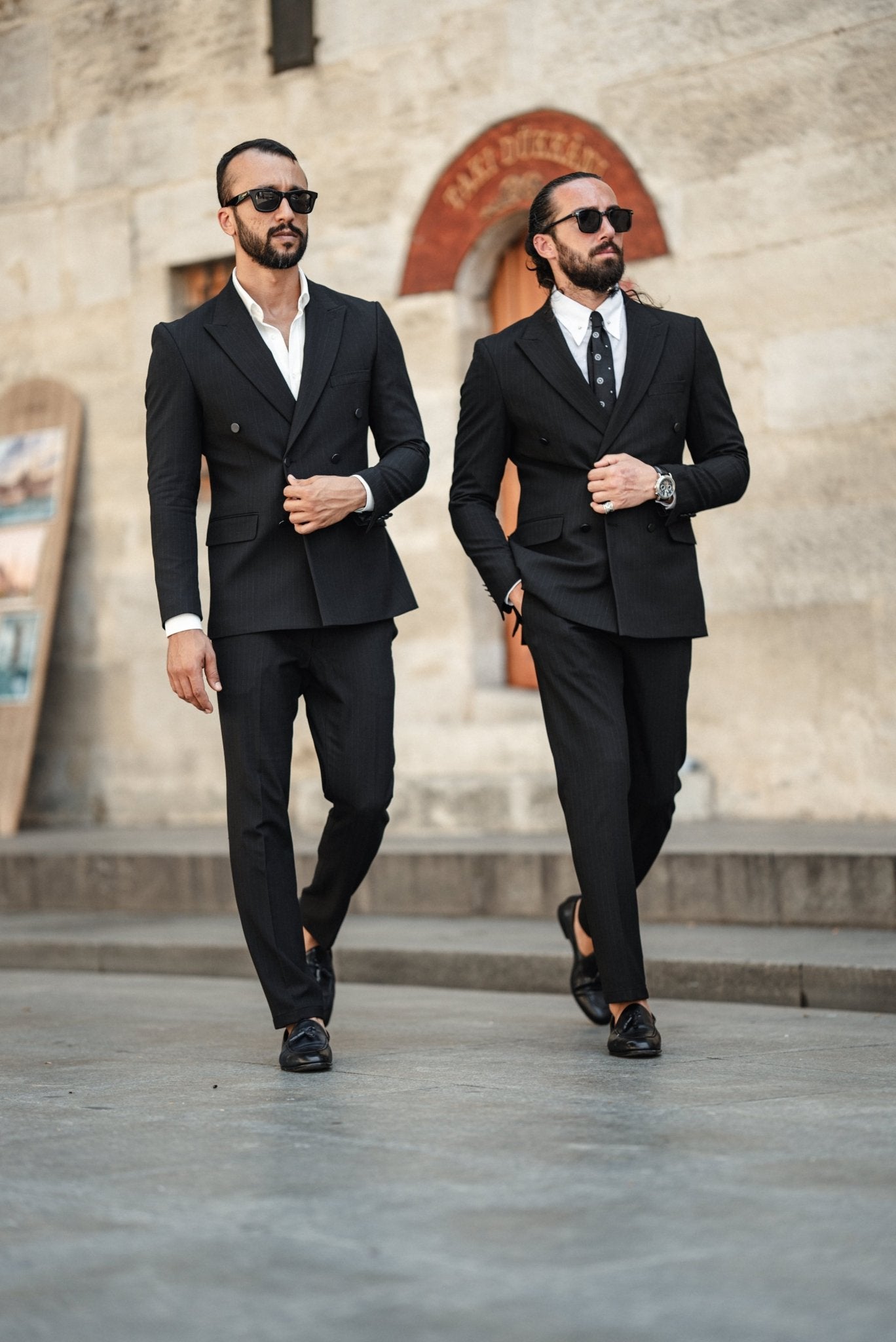 A Slim Fit Double Breasted Black Suit on Display. 