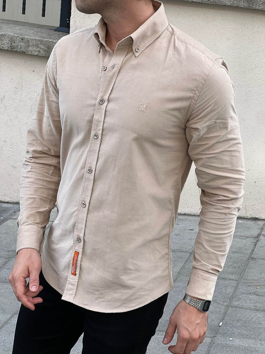 Our male model effortlessly flaunts the Velvet Beige Shirt, epitomizing refined style.