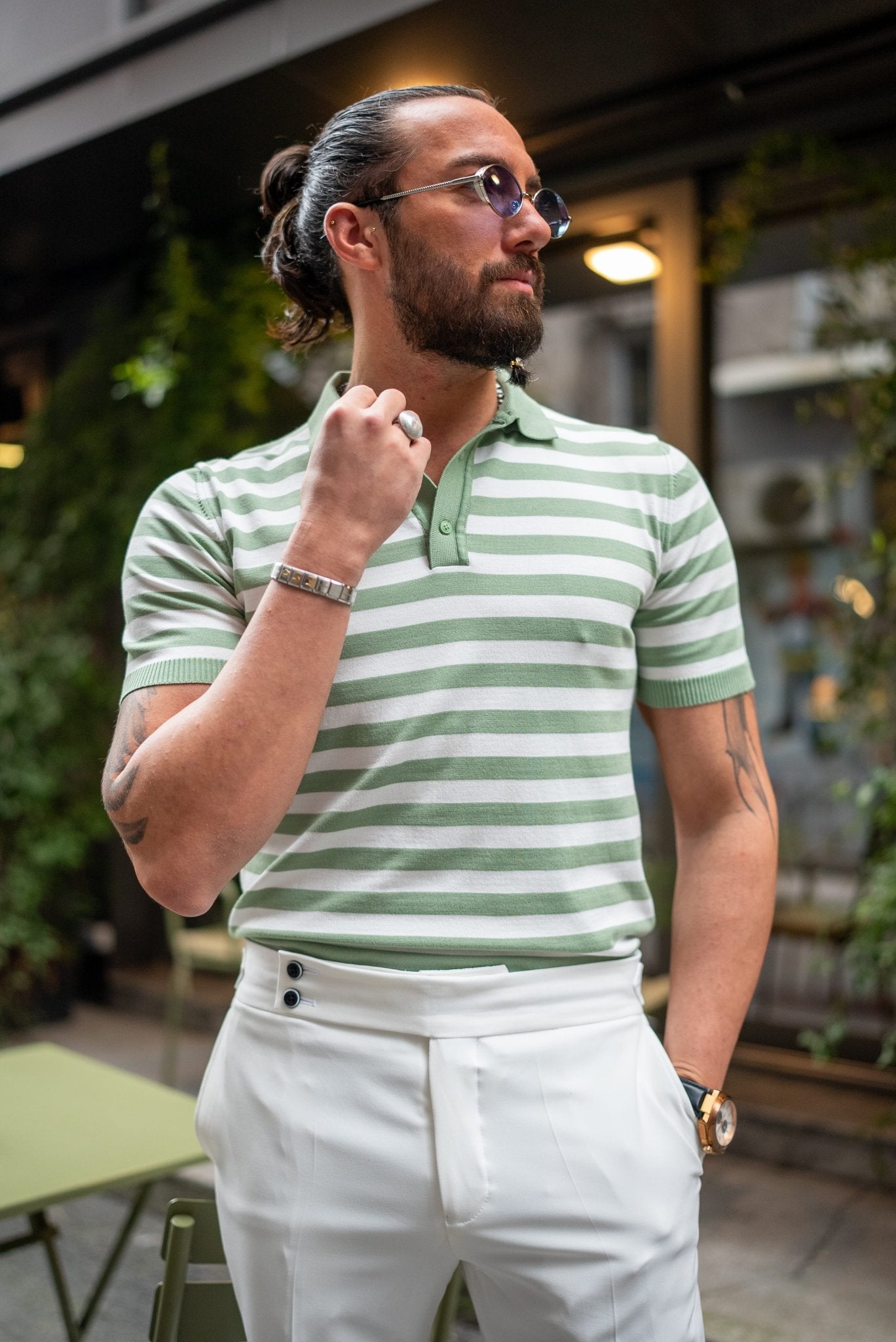 A Verdant Vibe Knit Polo worn by a model