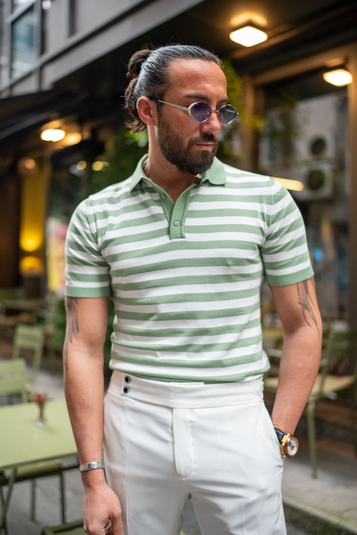 A Verdant Vibe Knit Polo worn by a model