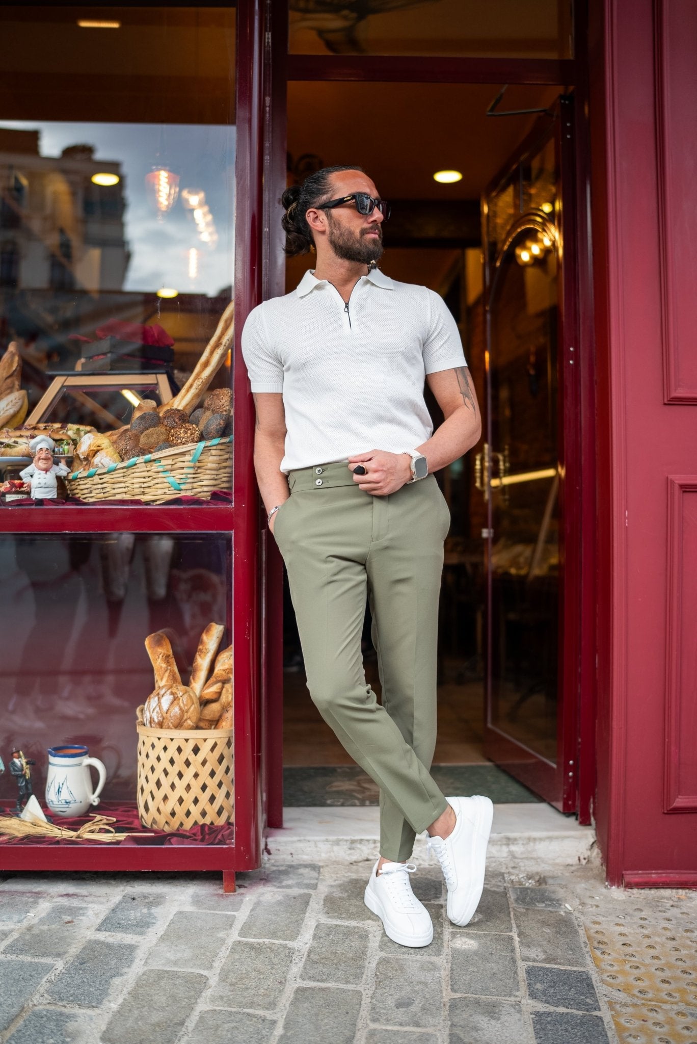 A Zippered Collar White Volta Knitwear worn by a model